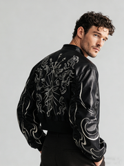 Cappotto in pelle ricamata a maniche corte con collo alto