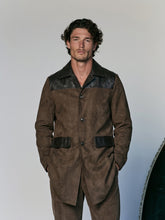 Men's long coat with leather paneling