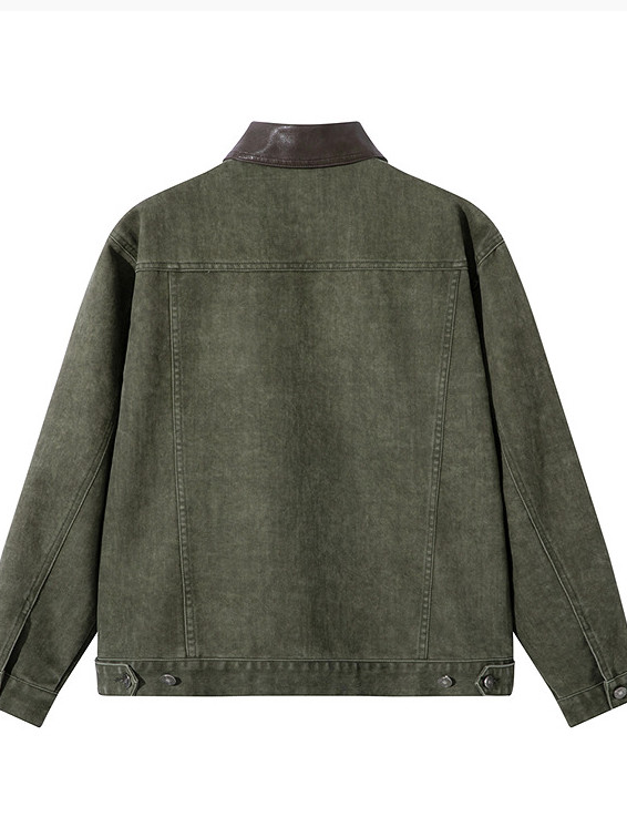 Washed, distressed denim jacket featuring color accents, pleated detailing, a lapel collar, and a loose fit.