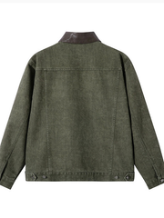 Washed, distressed denim jacket featuring color accents, pleated detailing, a lapel collar, and a loose fit.