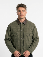 Washed, distressed denim jacket featuring color accents, pleated detailing, a lapel collar, and a loose fit.